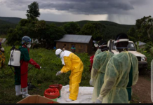 Ebola: Govt announces 3-week lockdown Health workers on duty in Uganda